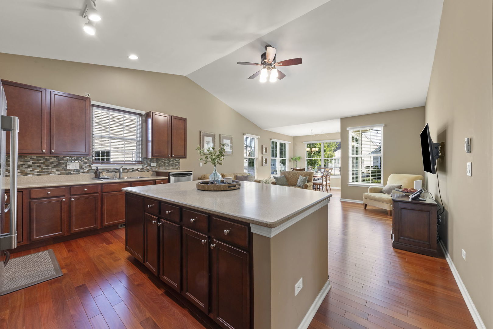 929 Fairmont Road Pingree Grove, IL 60140 - Photo 9 of 28 a kitchen with counter top space appliances and wooden floor