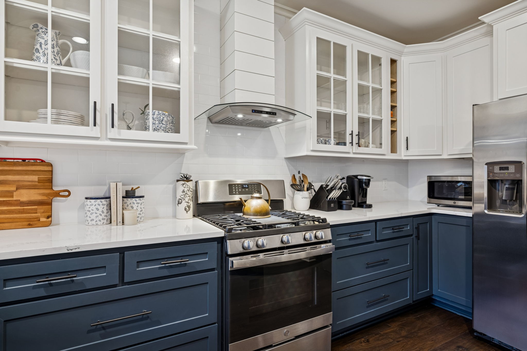 102 Pearl Street Franklin, TN 37064 - Photo 36 of 71 a kitchen with stainless steel appliances granite countertop a stove and a sink