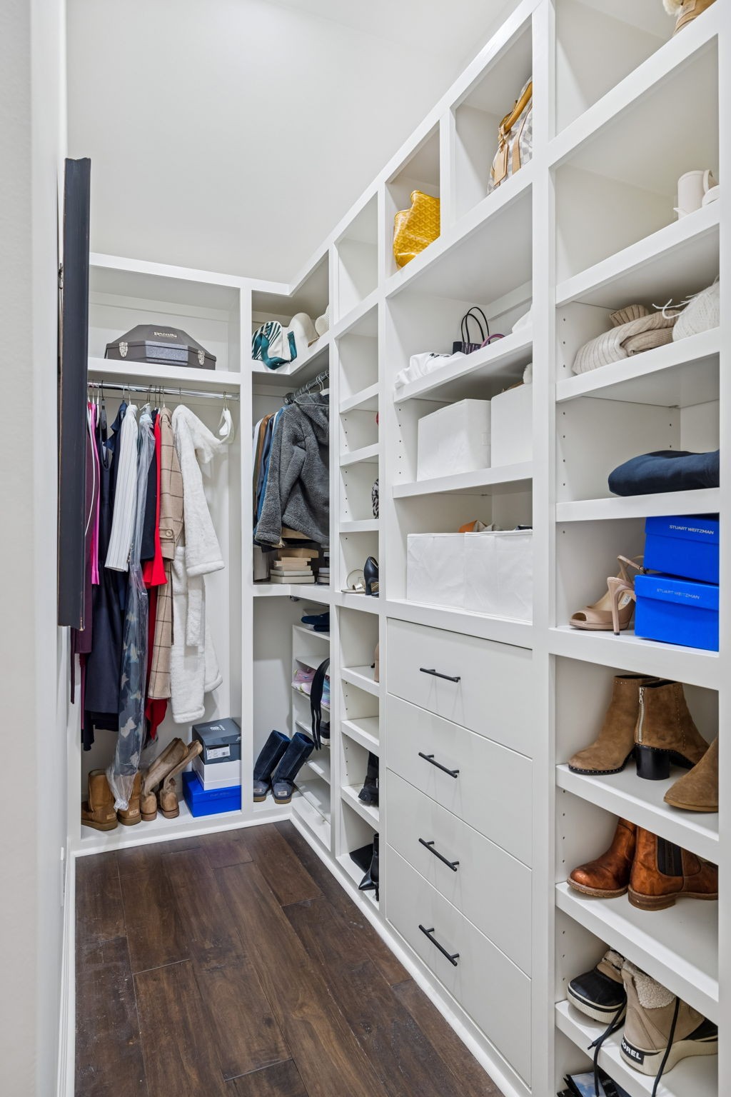 102 Pearl Street Franklin, TN 37064 - Photo 56 of 71 a view of walk in closet with clothes and shoes