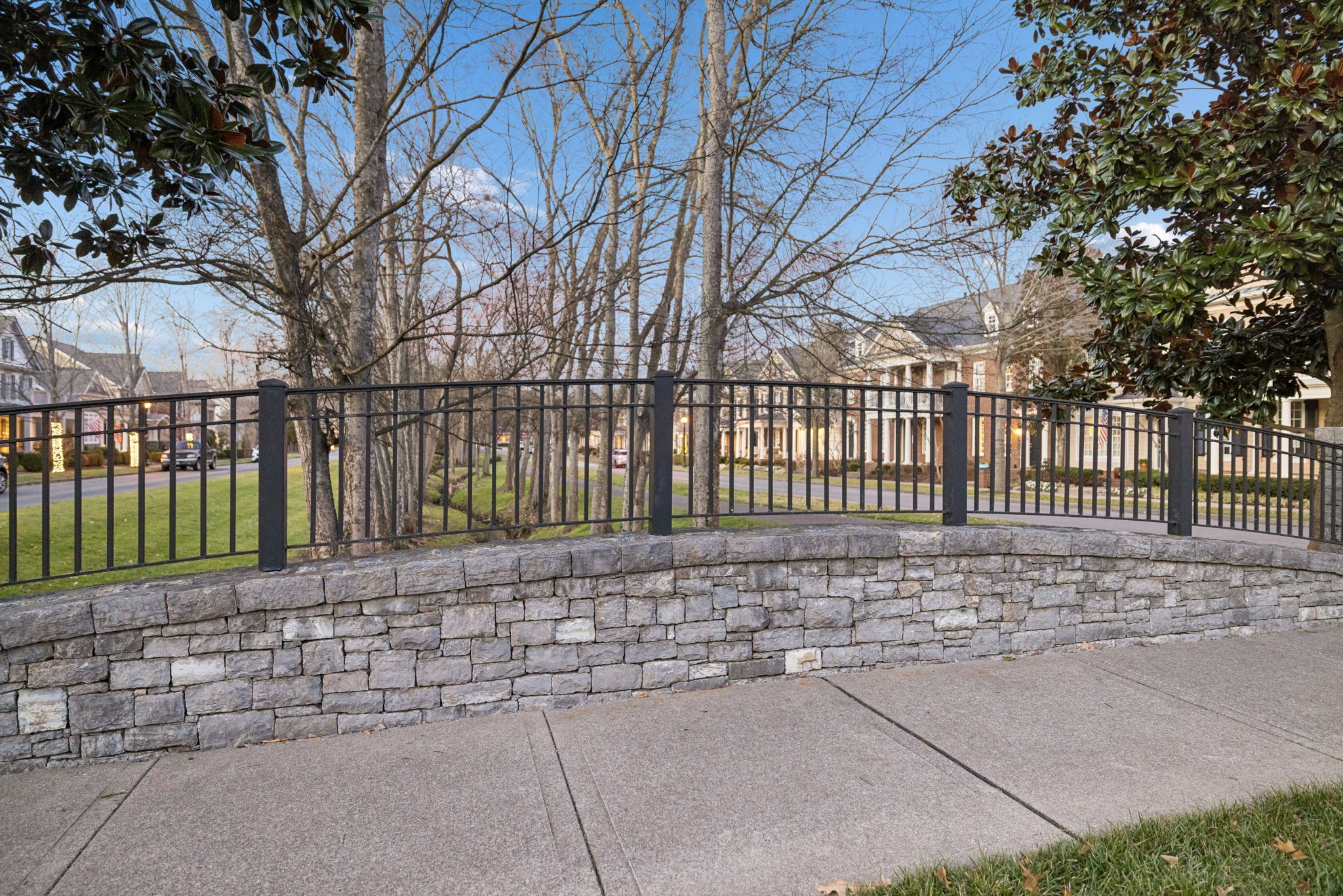102 Pearl Street Franklin, TN 37064 - Photo 69 of 71 a pathway of a house with a small yard and wooden fence