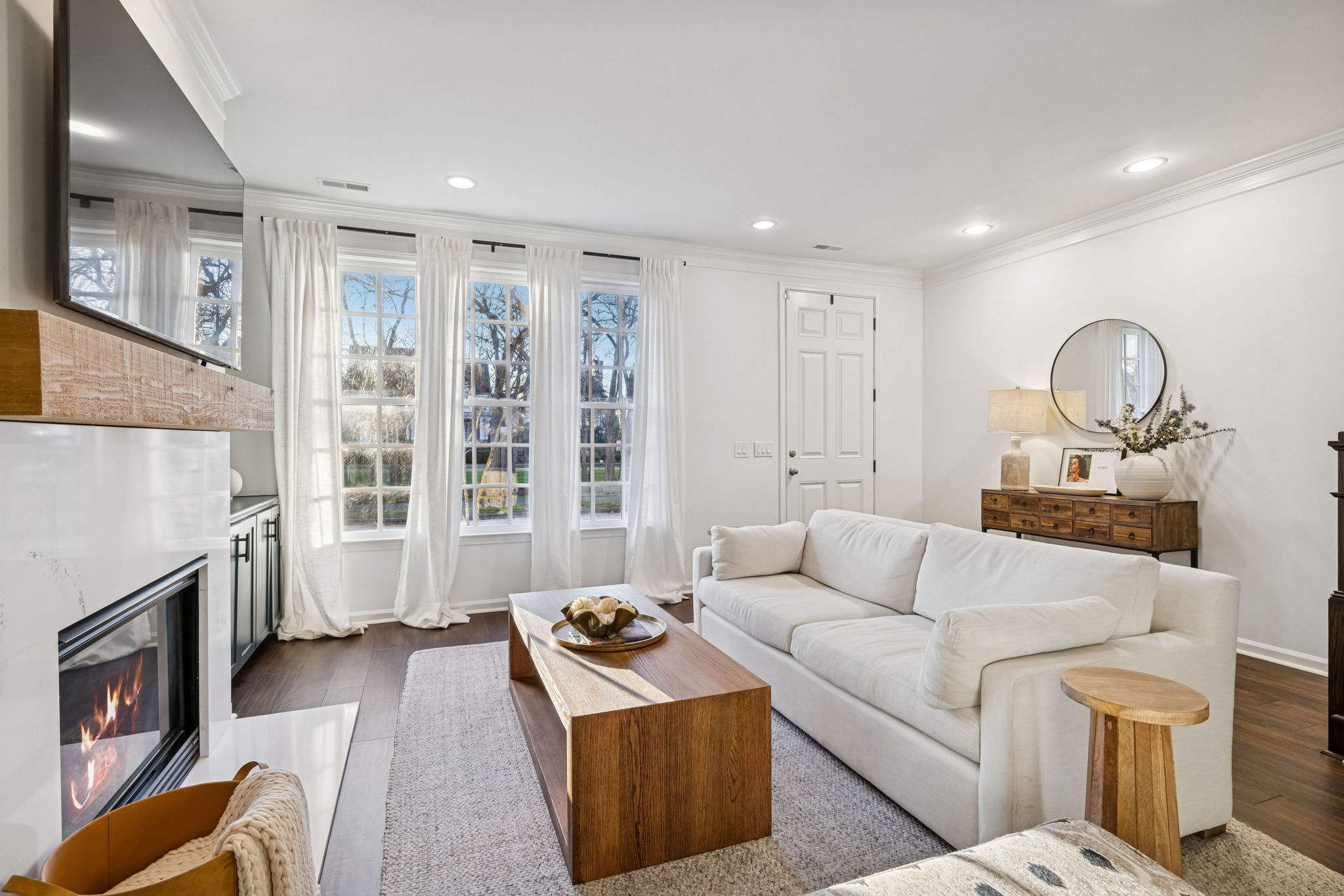 102 Pearl Street Franklin, TN 37064 - Photo 10 of 71 a living room with furniture and a fireplace