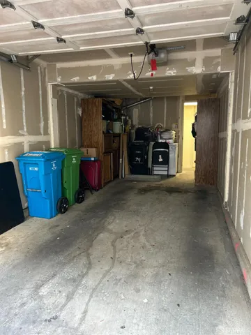 a view of water heater room with gym equipment