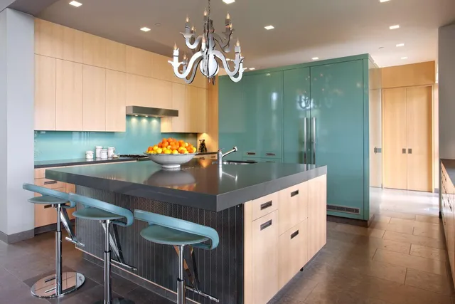 a bathroom with a sink a large mirror and a shower