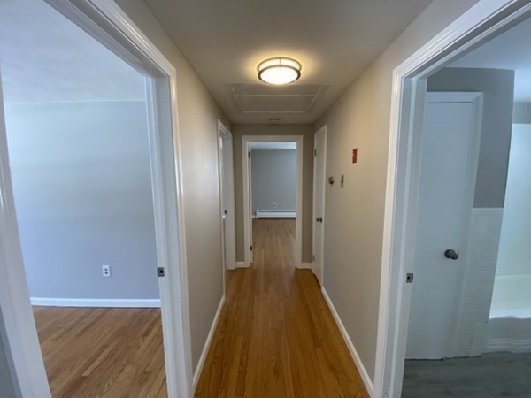 72 Bliss Street Northampton, MA 01062 - Photo 11 of 20 a view of a hallway with wooden floor