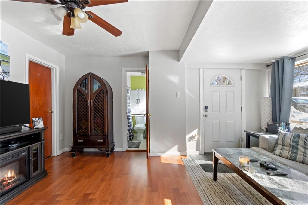 917 Session Street Pittsburgh, PA 15207 - Photo 5 of 15 a view of a livingroom with furniture and a flat screen tv
