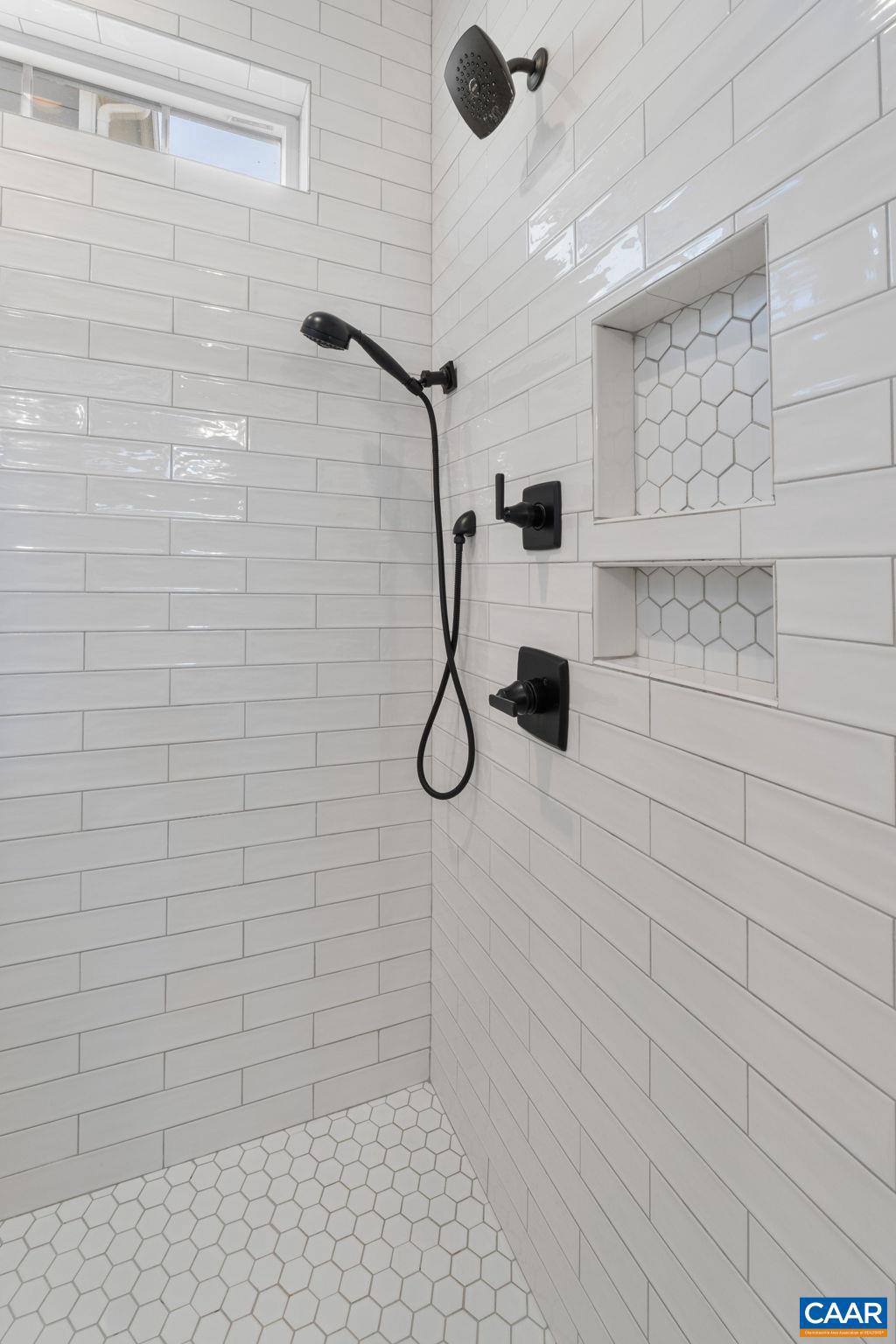 2206 Fowler Street Charlottesville, VA 22901 - Photo 24 of 59 a bathroom with a shower