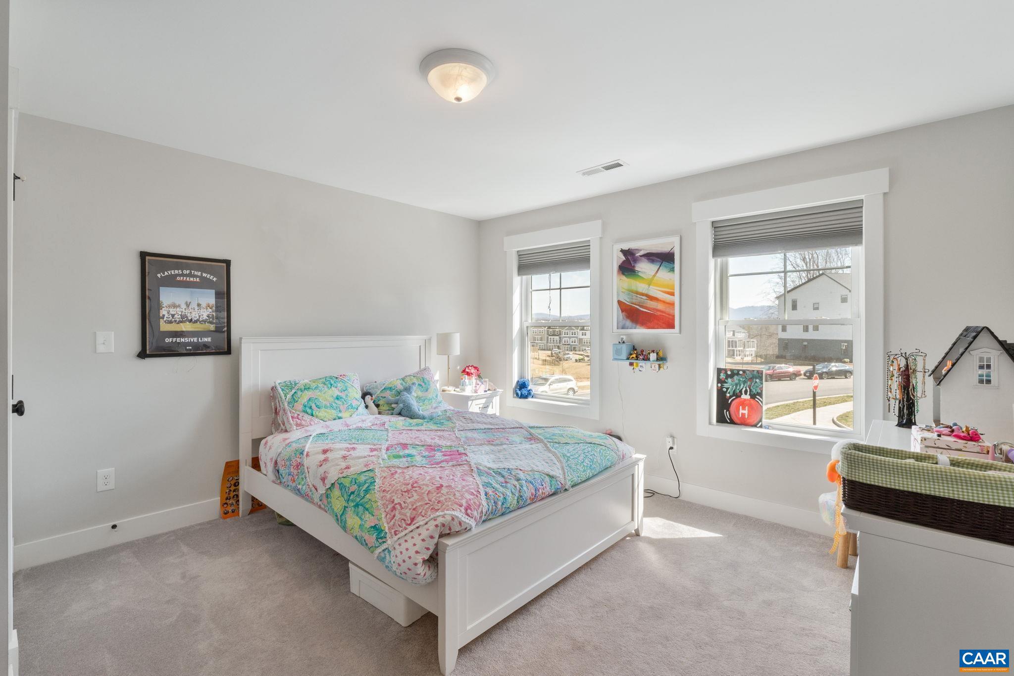 2206 Fowler Street Charlottesville, VA 22901 - Photo 27 of 59 a bedroom with a bed and dresser