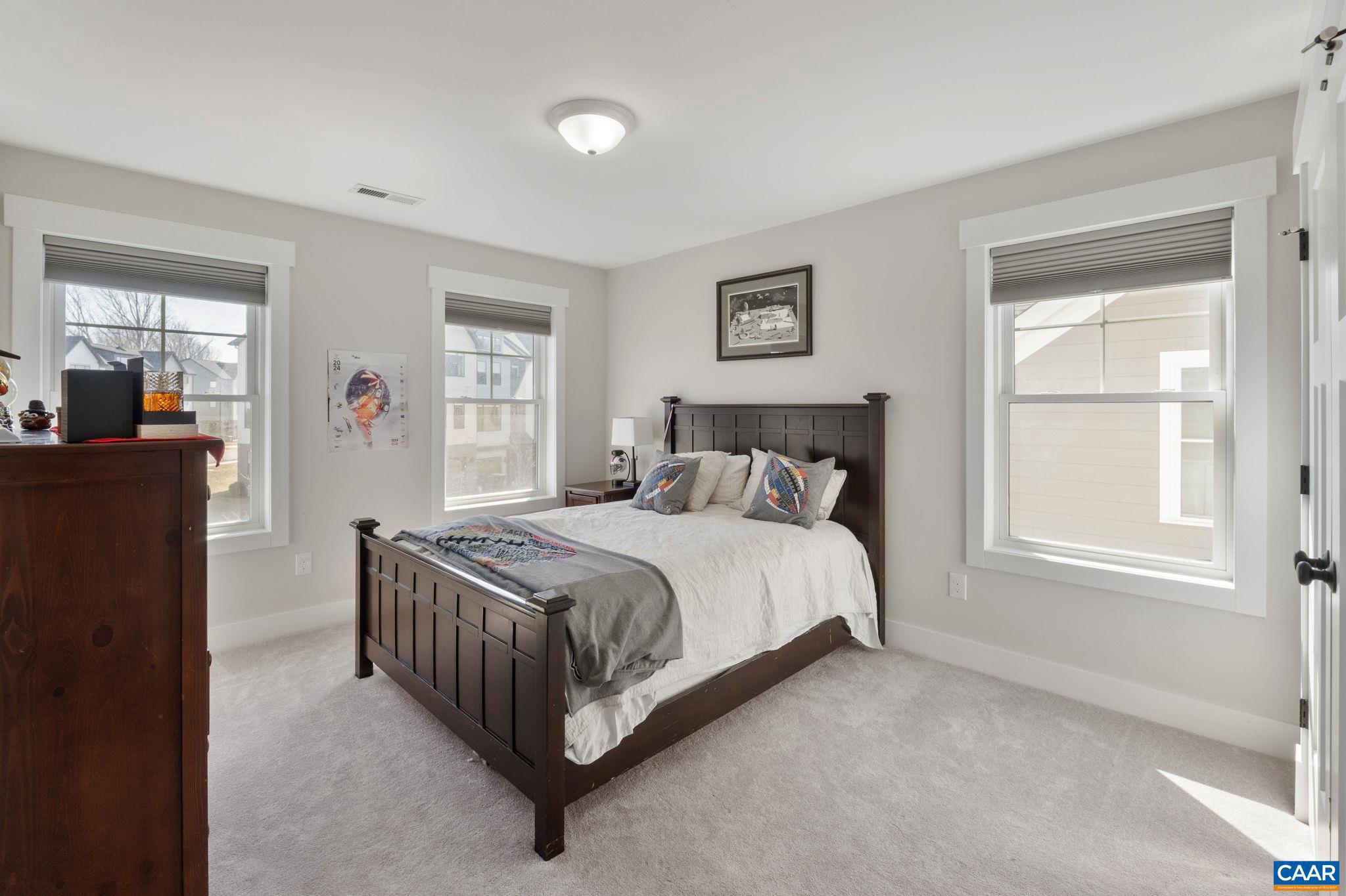 2206 Fowler Street Charlottesville, VA 22901 - Photo 34 of 59 a bedroom with a bed and window
