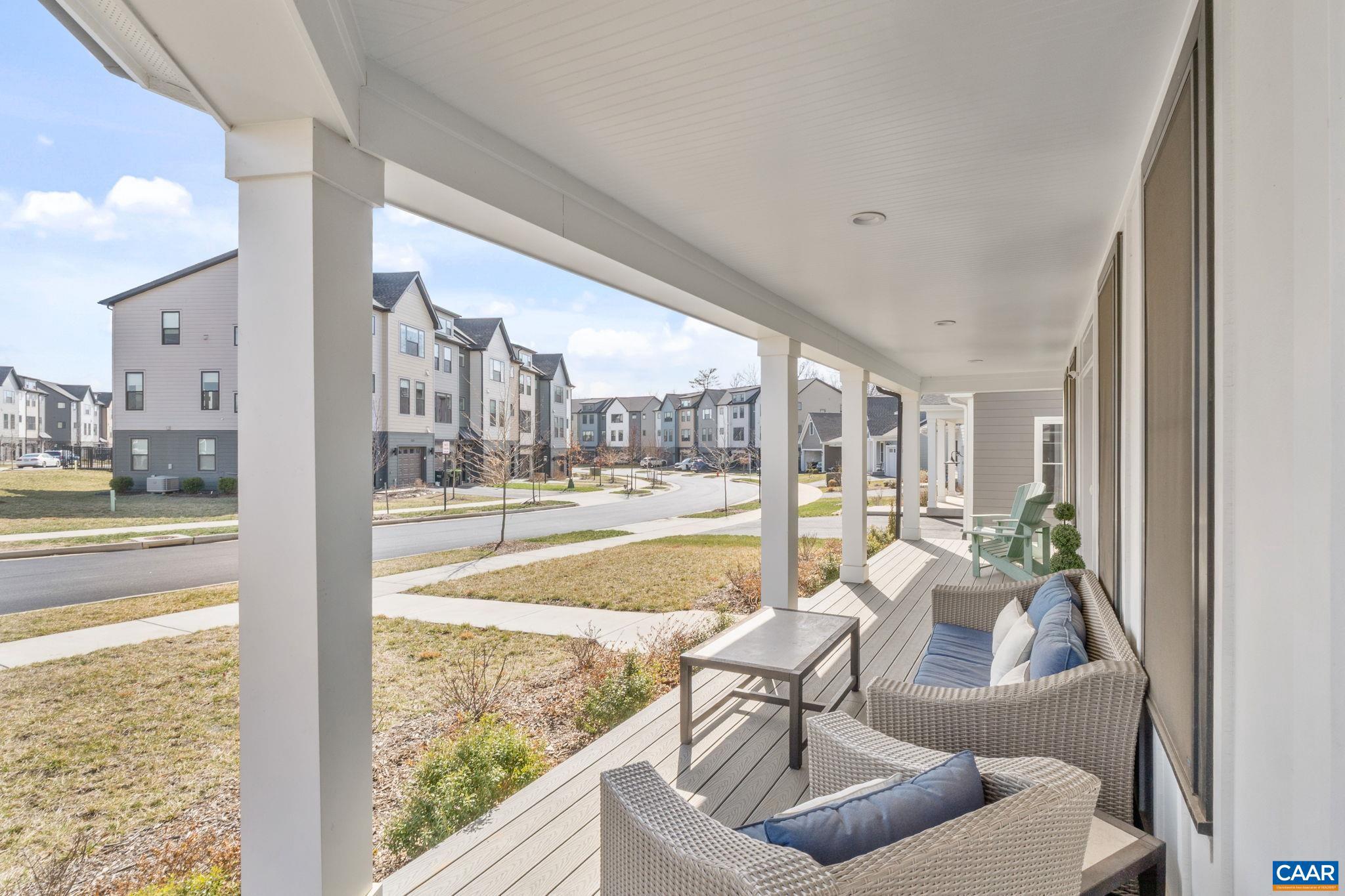2206 Fowler Street Charlottesville, VA 22901 - Photo 4 of 59 a living room with furniture and a floor to ceiling window