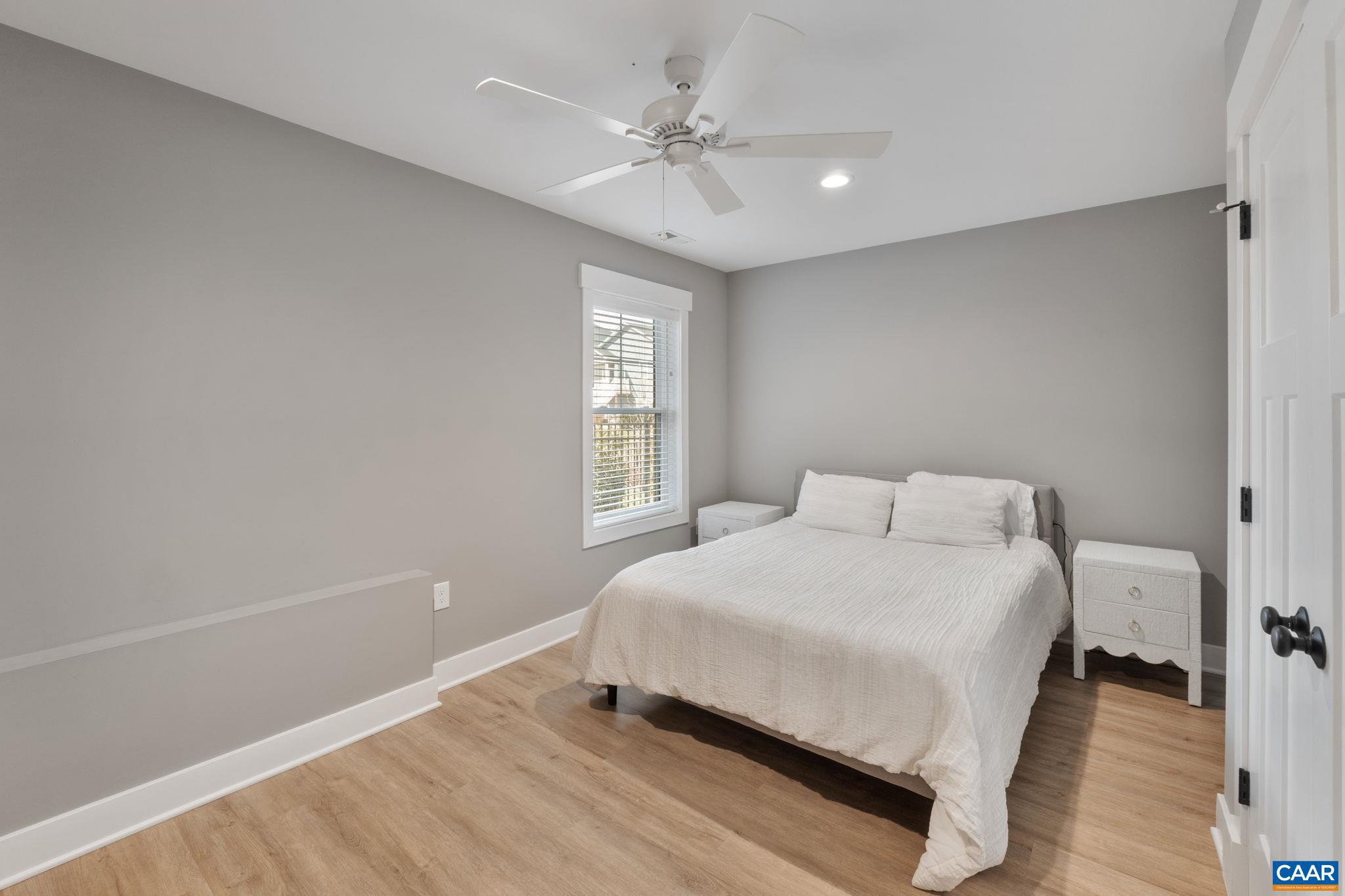 2206 Fowler Street Charlottesville, VA 22901 - Photo 41 of 59 a bedroom with a bed and a window
