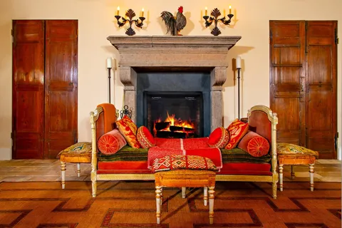 a outdoor living space with furniture and a chandelier