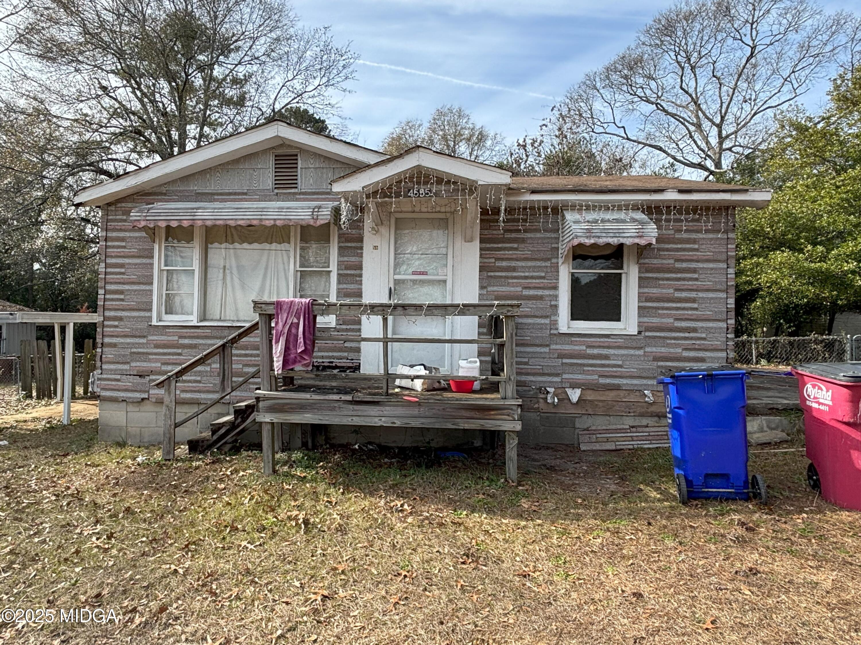 4555 Bishop Road Macon, GA 31206 - Photo 1 of 1 a front view of a house with yard