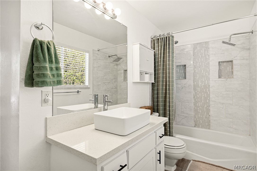 316 Pioneer Road Lake Arrowhead, CA 92352 - Photo 14 of 35 a bathroom with a sink toilet and shower