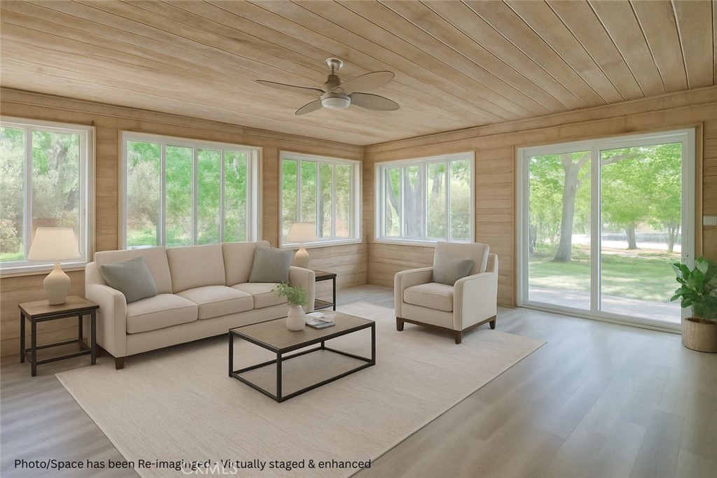 6060 Miners Ranch Road Oroville, CA 95966 - Photo 11 of 66 a living room with furniture and a large window