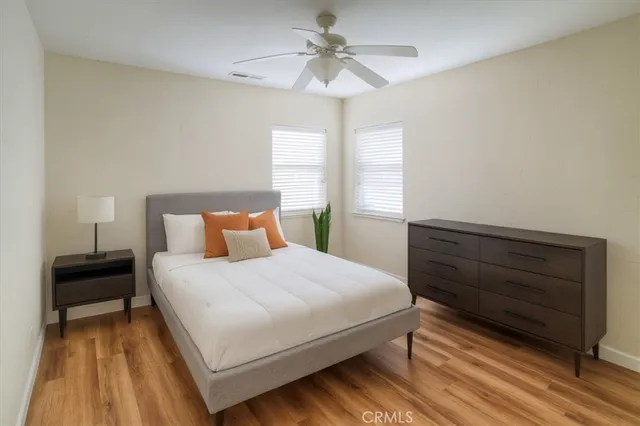 a view of a backyard with large trees