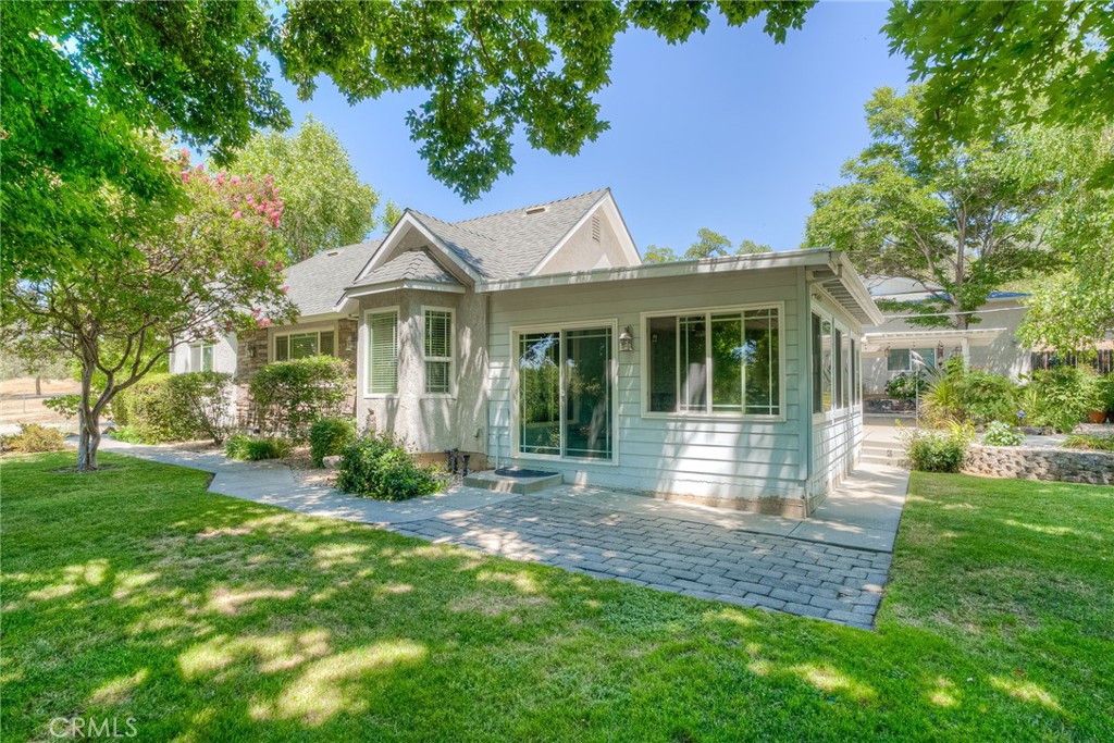 6060 Miners Ranch Road Oroville, CA 95966 - Photo 24 of 66 a front view of a house with garden