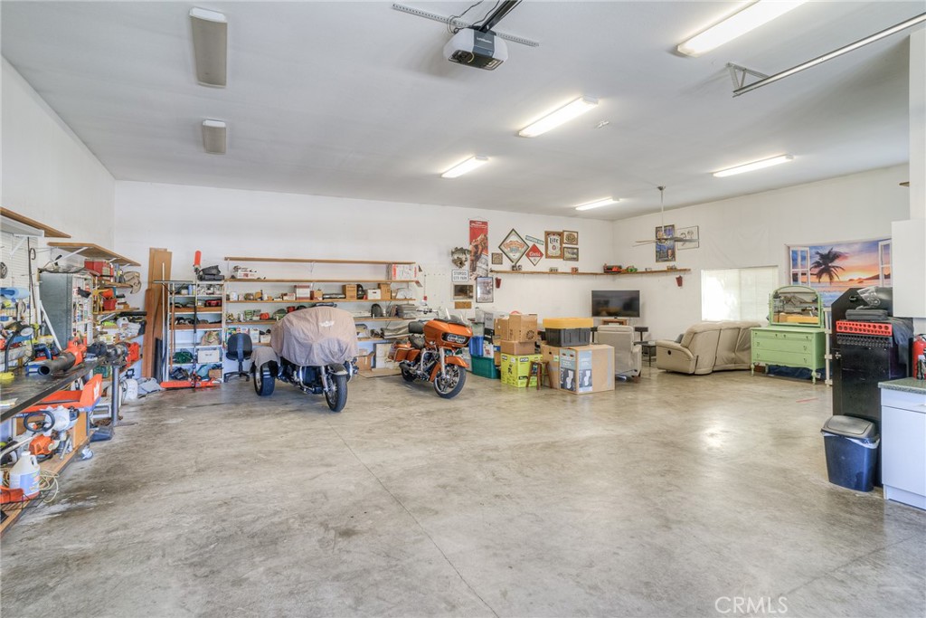 6060 Miners Ranch Road Oroville, CA 95966 - Photo 31 of 66 a view of a garage with a lot of stuff