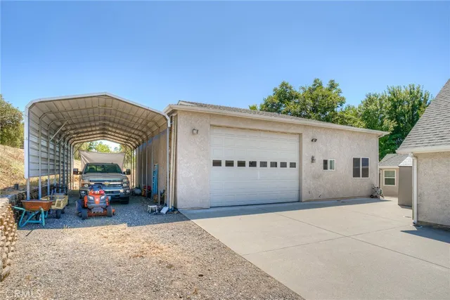 a view of a road with a trees in the background