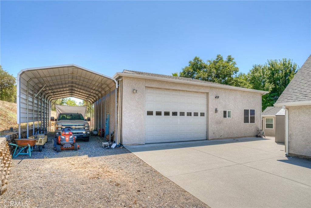 6060 Miners Ranch Road Oroville, CA 95966 - Photo 34 of 66 a view of a house with a outdoor space