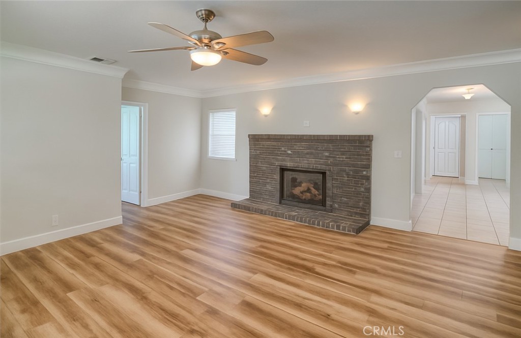 6060 Miners Ranch Road Oroville, CA 95966 - Photo 7 of 66 a view of empty room with wooden floor and fan