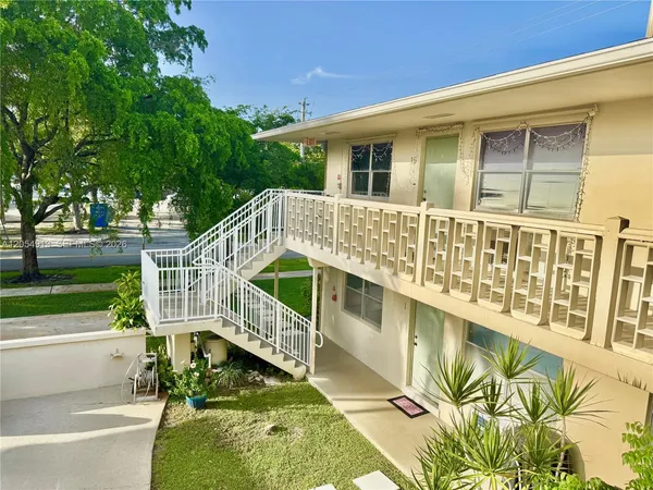 a balcony with furniture