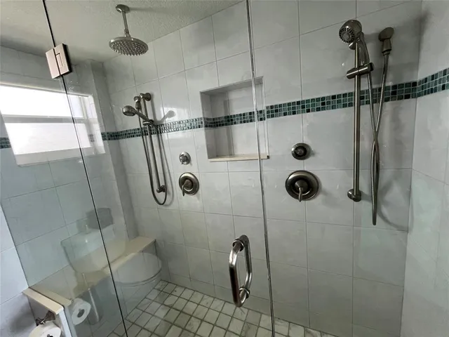 a view of a patio with chairs and table on the terrace