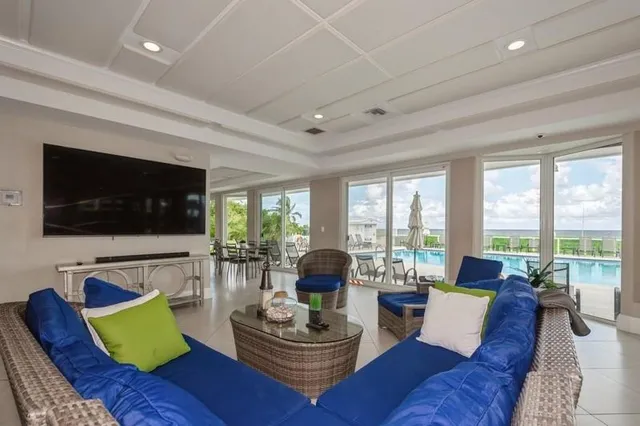 a view of a dining room with furniture window and outside view