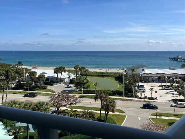 a view of swimming pool from a balcony