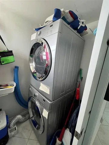 a view of a swimming pool patio and outdoor seating