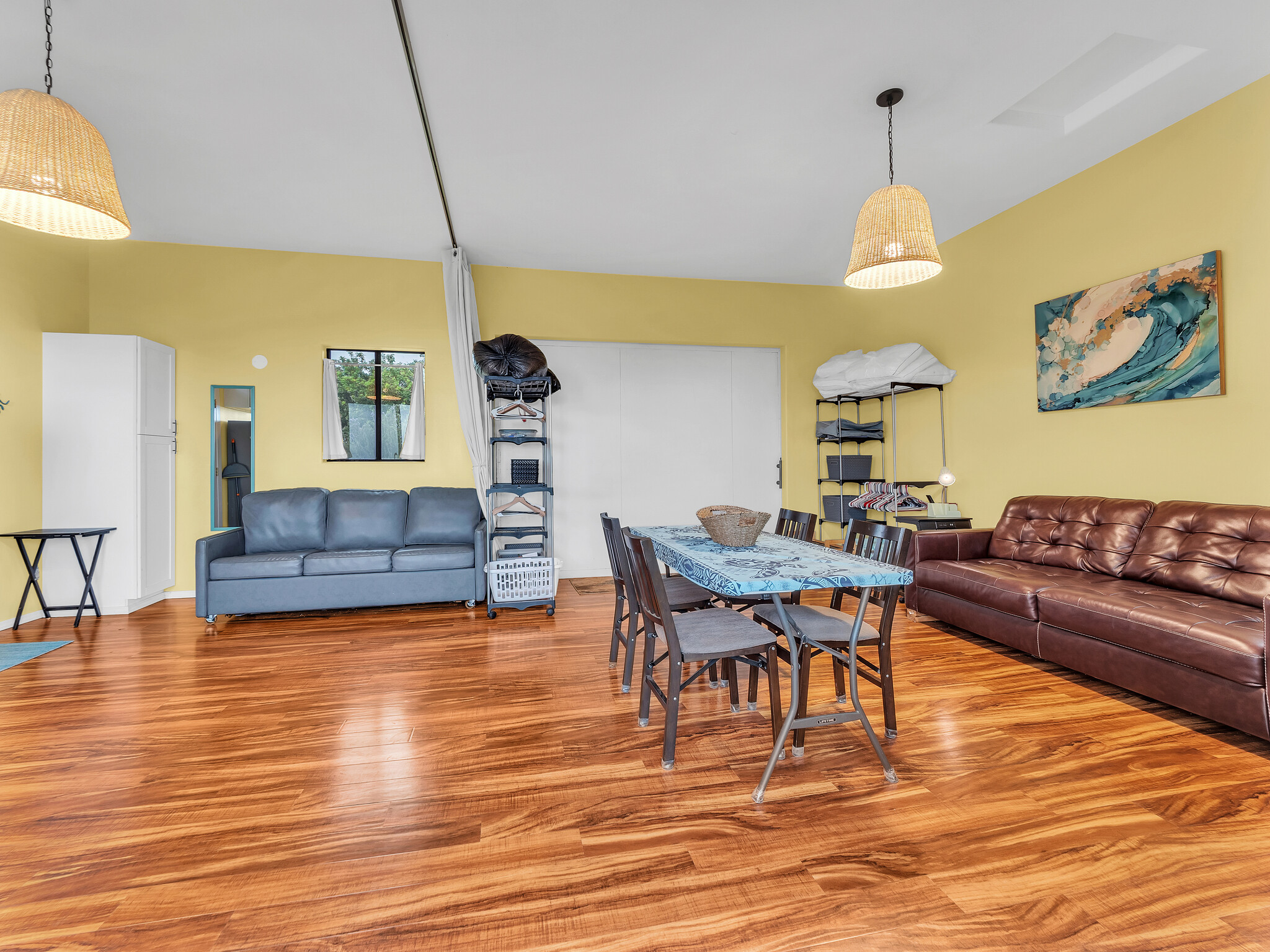 94-1769 Amepela Road Naalehu, HI 96772 - Photo 19 of 29 a living room with furniture and a wooden floor