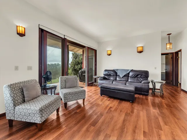 a front view of house with yard outdoor seating and green space