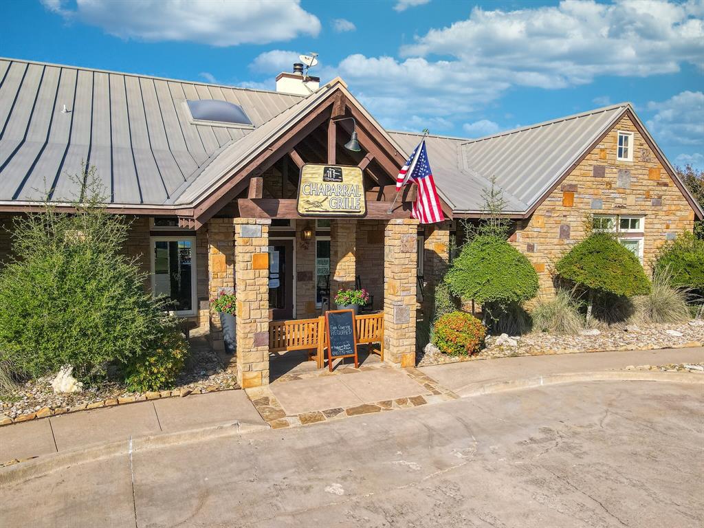 2 Inverness Drive Graford, TX 76449 - Photo 17 of 30 a view of a house with a yard and sitting area
