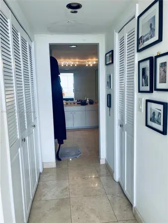 a bathroom with a double vanity sink and mirror