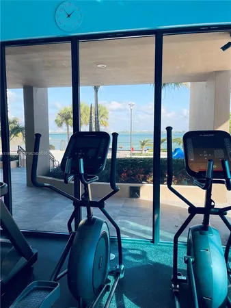 a view of outdoor space with lots of furniture and wooden floor