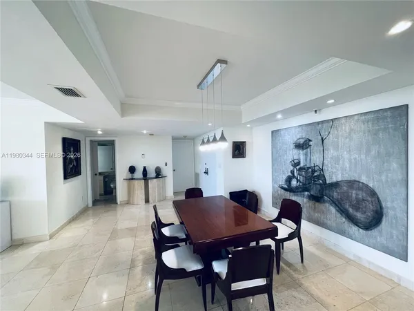 a view of a dining room with furniture