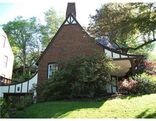 122 Gladstone Road Pittsburgh, PA 15217 - Photo 2 of 18 Exterior Back. One car integral garage on left hand side with room for two more cars