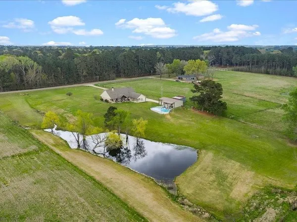 a view of a lake from a yard