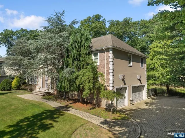 a house with trees in the background