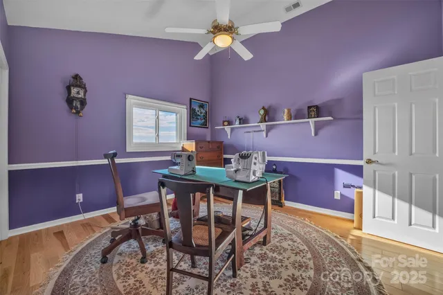 a workspace with furniture and window