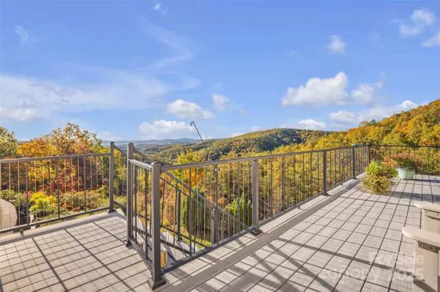 a view of a yard with an ocean view