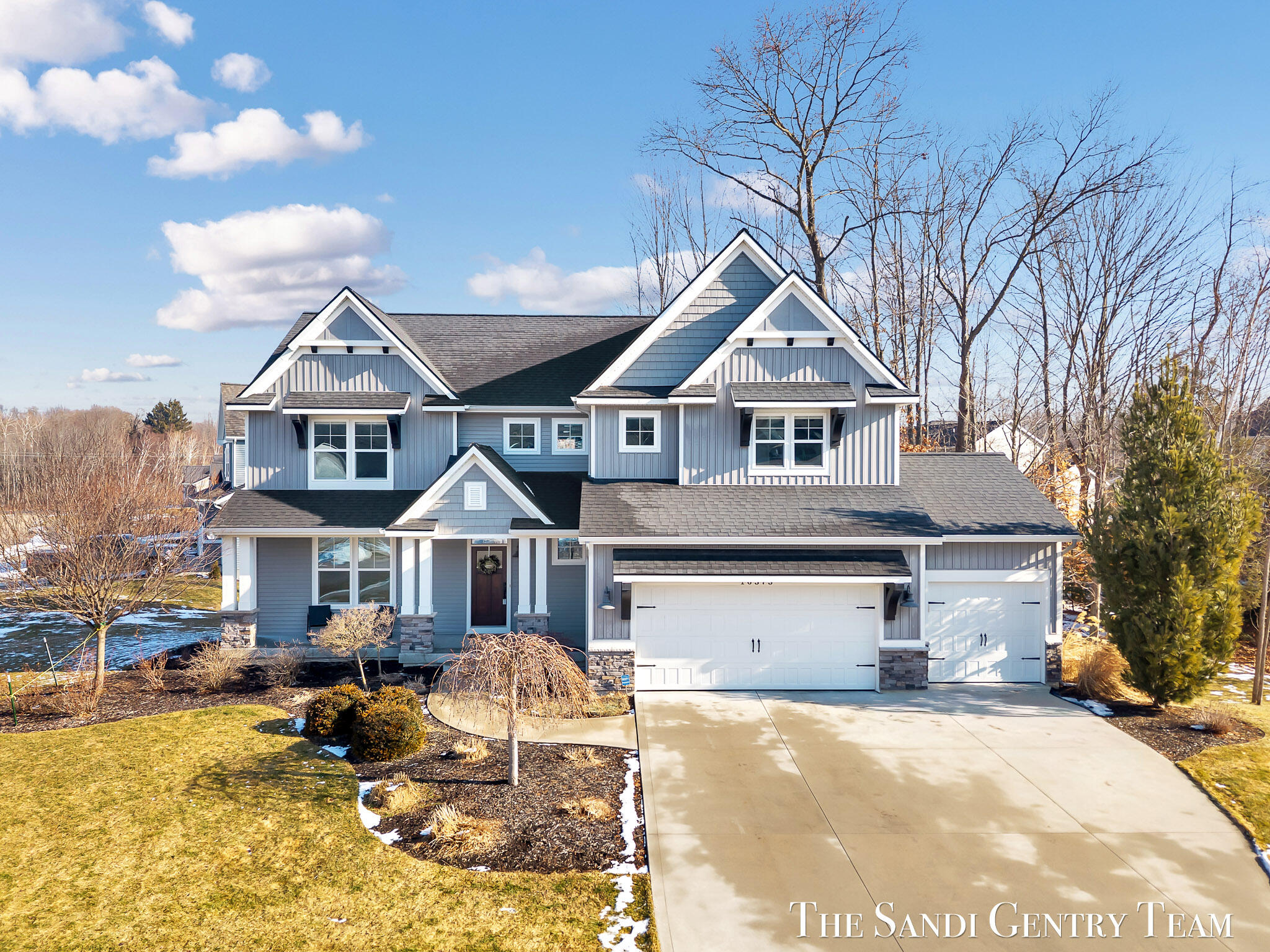 16575 Spring Tree Drive Spring Lake, MI 49456 - Photo 2 of 61 07-DJI_20260227101305_0007_D