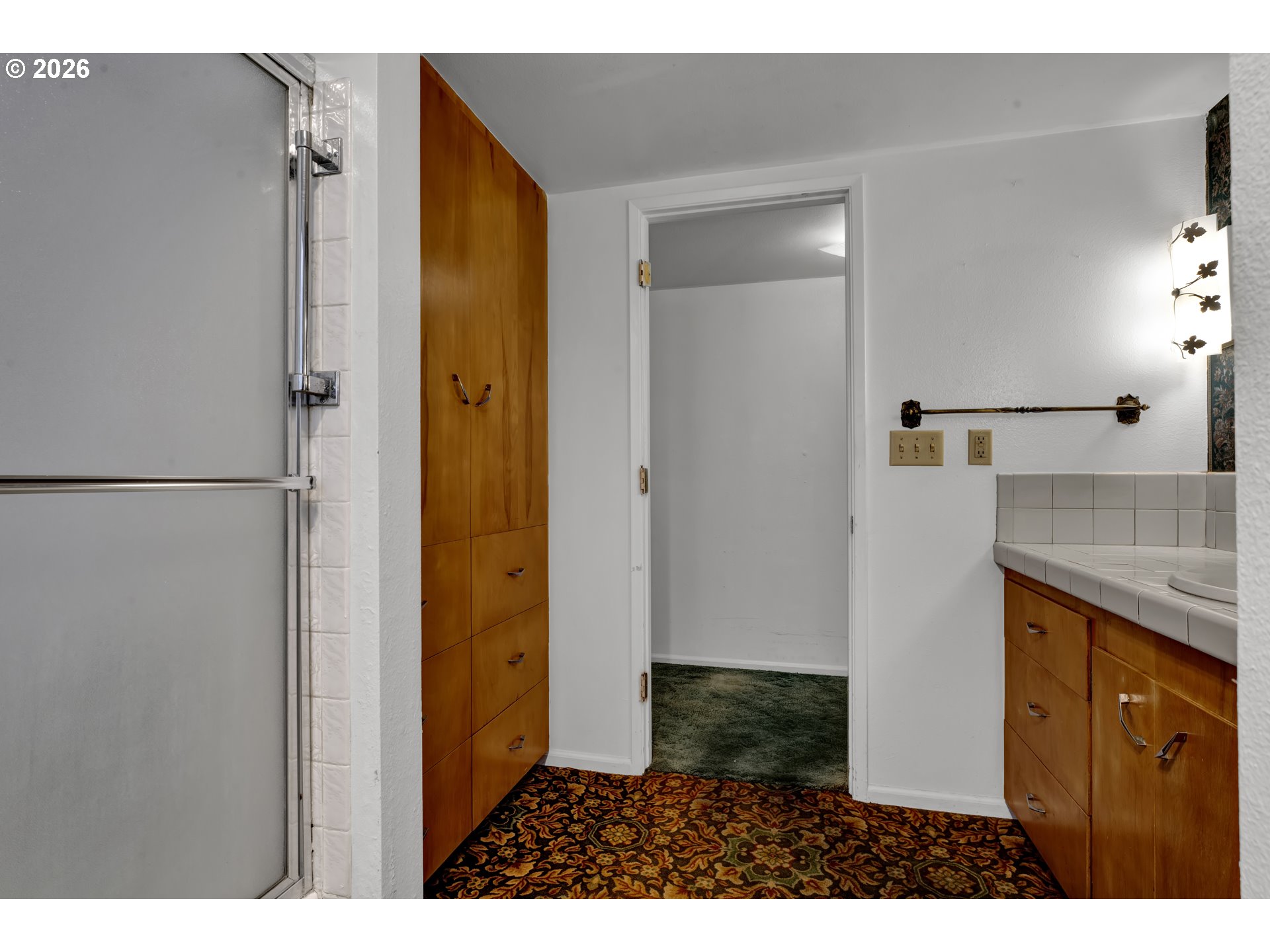 777 Rhododendron Drive Florence, OR 97439 - Photo 14 of 41 a bathroom with a sink and a mirror