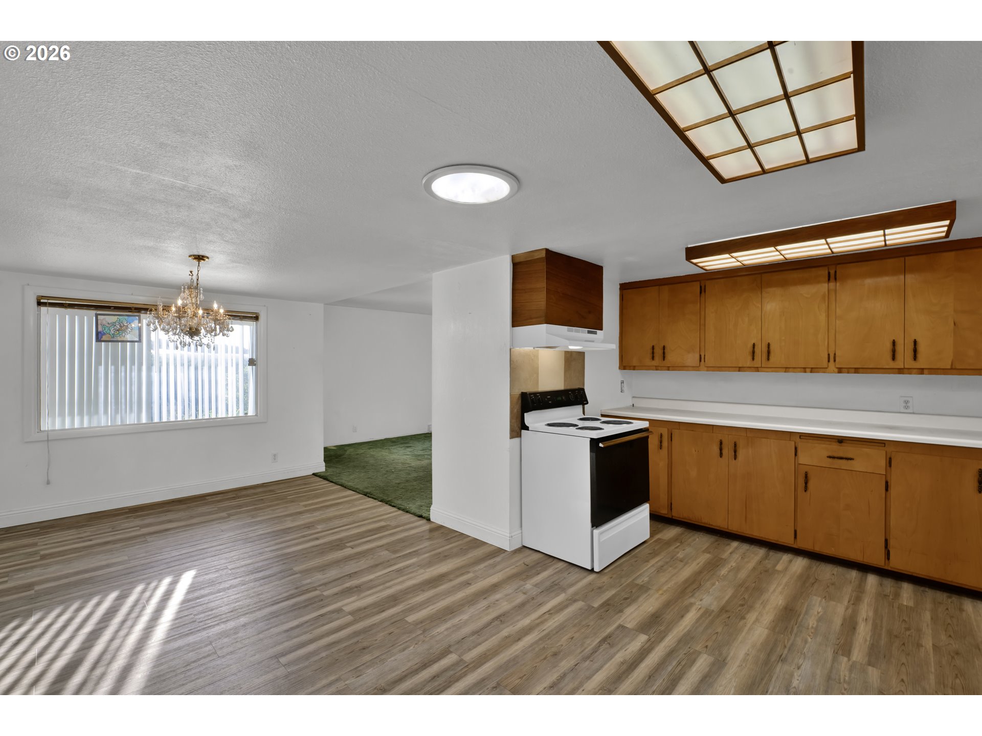 777 Rhododendron Drive Florence, OR 97439 - Photo 18 of 41 a kitchen with a sink cabinets and window