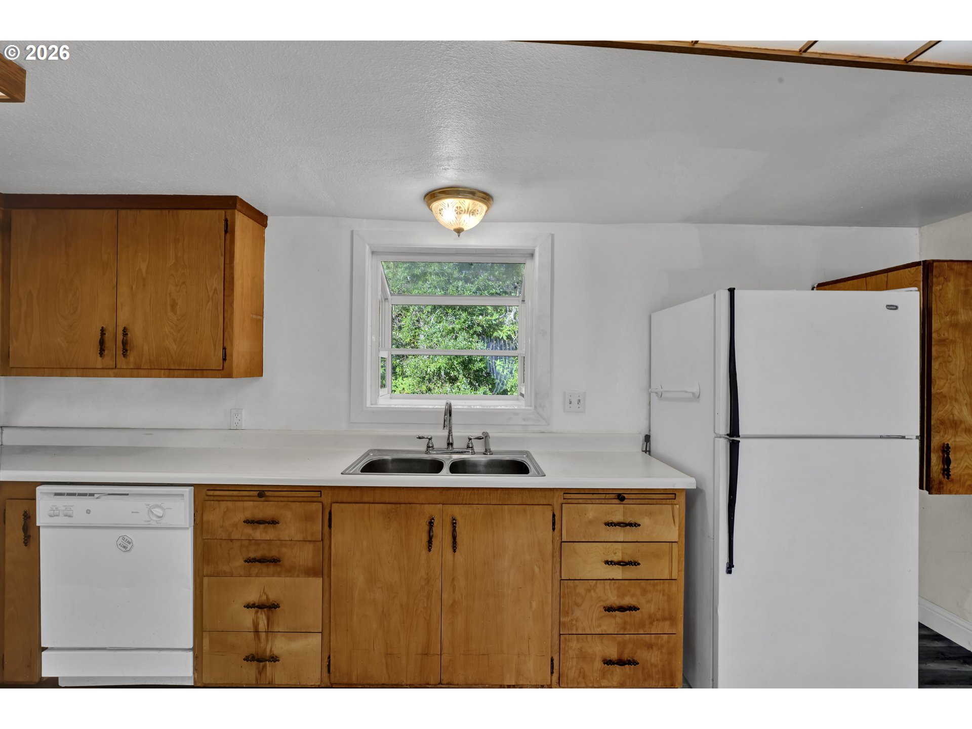 777 Rhododendron Drive Florence, OR 97439 - Photo 21 of 41 a bathroom with a sink and a mirror