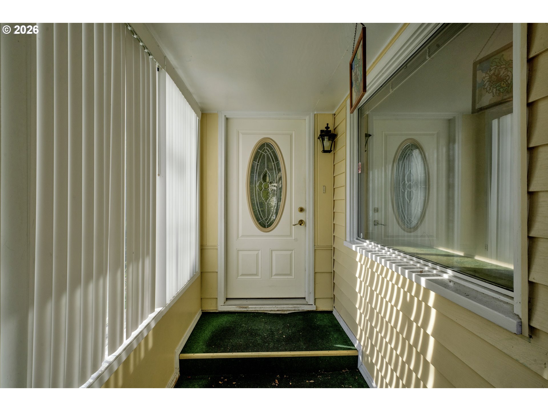 777 Rhododendron Drive Florence, OR 97439 - Photo 3 of 41 a front view of a house with garden