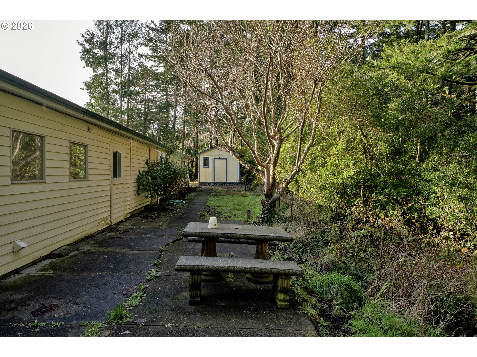 777 Rhododendron Drive Florence, OR 97439 - Photo 39 of 41 a house view with a outdoor space