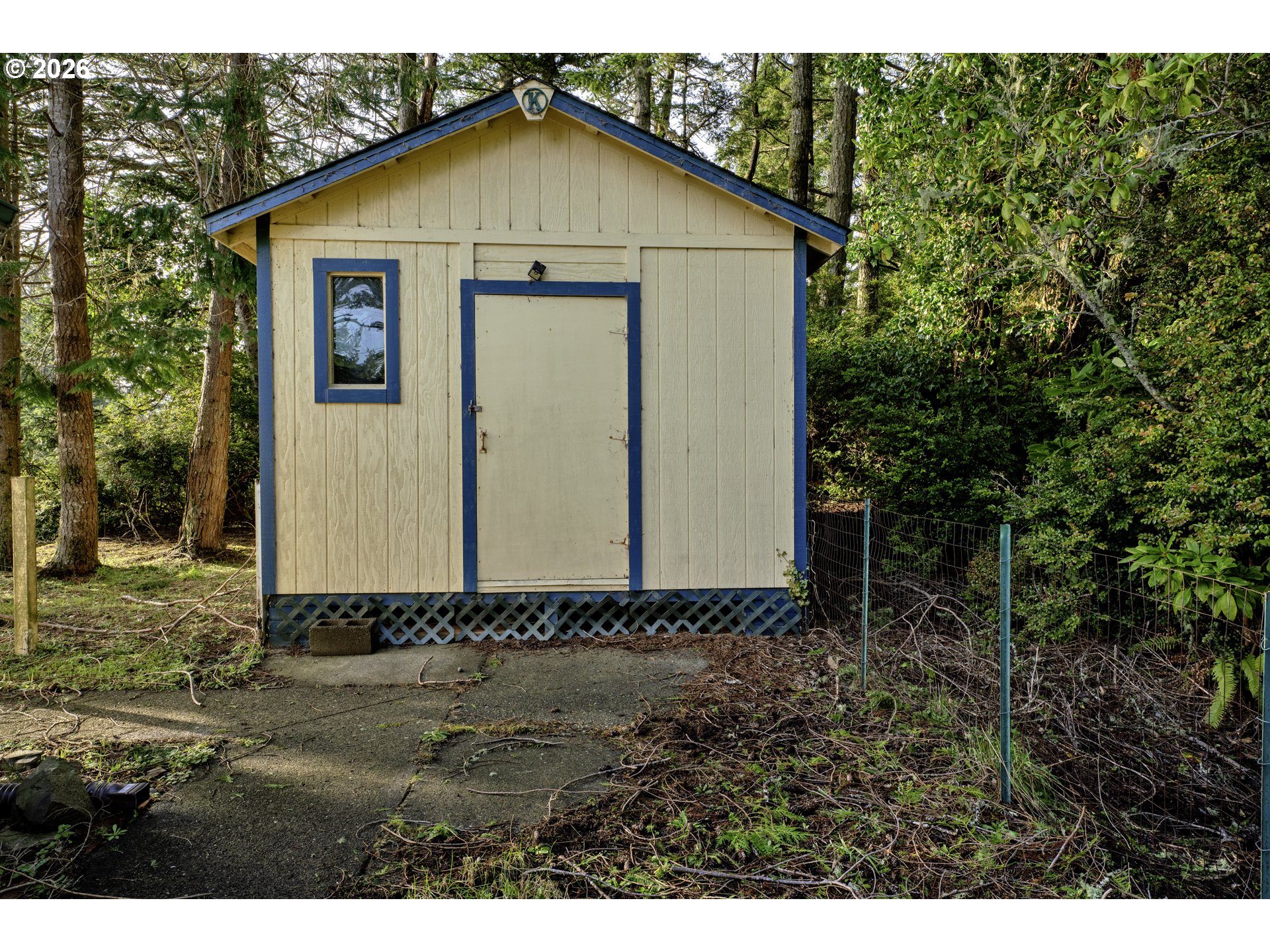 777 Rhododendron Drive Florence, OR 97439 - Photo 40 of 41 a view of small house with a yard