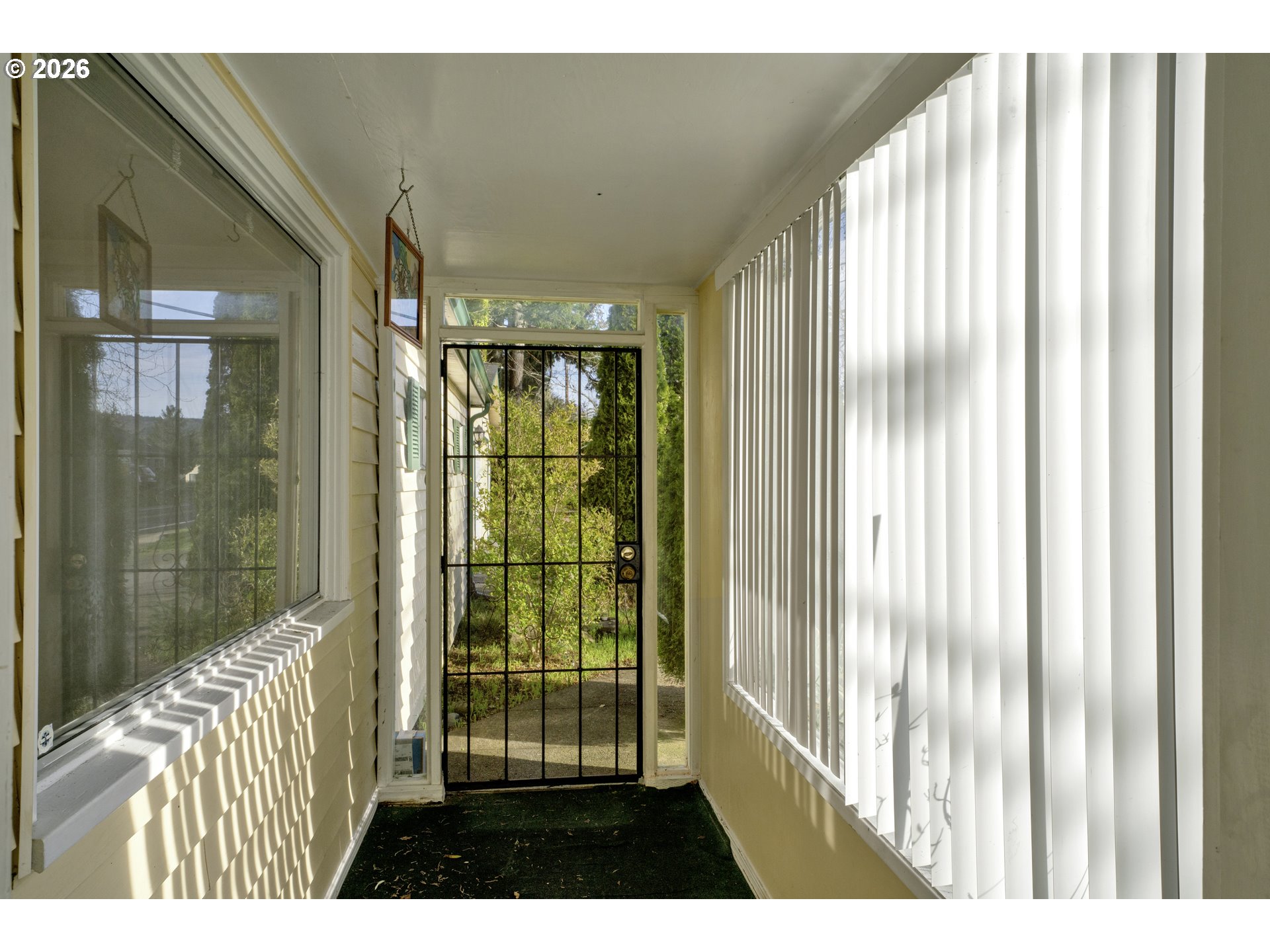 777 Rhododendron Drive Florence, OR 97439 - Photo 4 of 41 a view of entryway with a floor to ceiling window