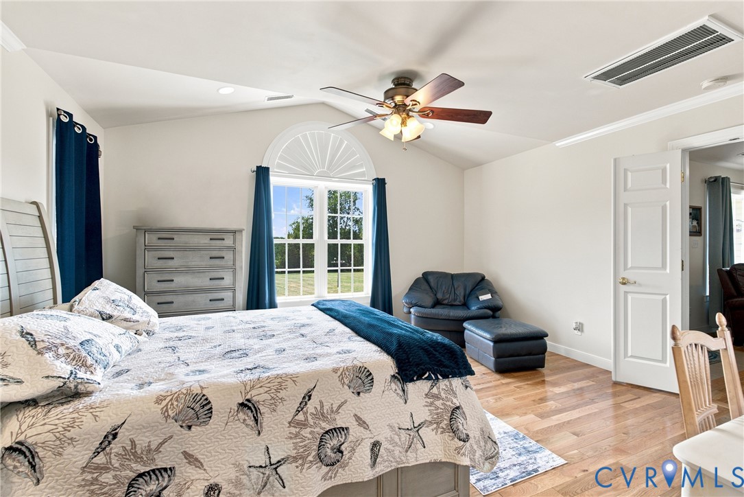 197 Goshen Road Cumberland, VA 23040 - Photo 29 of 70 Vaulted ceiling bedroom with a large arched window