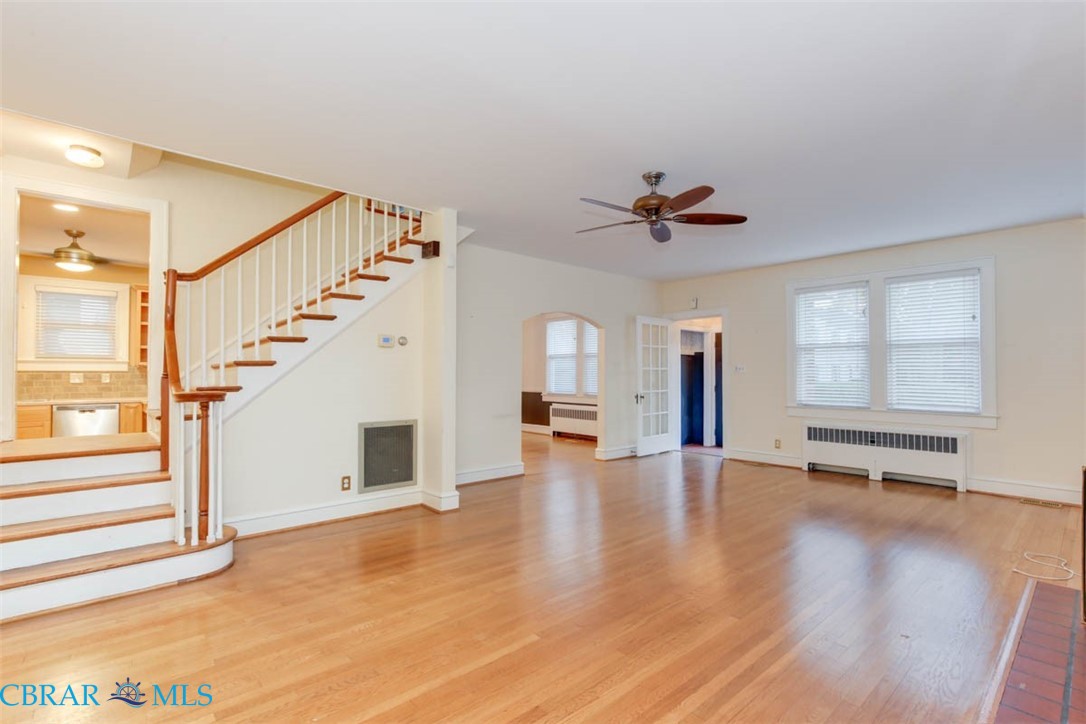 144 Meredith Street Hampton, VA 23669 - Photo 8 of 36 a view of an empty room with a window and wooden floor
